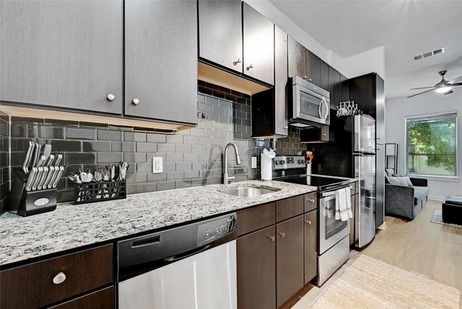 Fully furnished kitchen. | Image 8