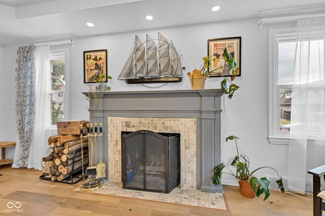 The living room opens to the covered porch. | Image 6