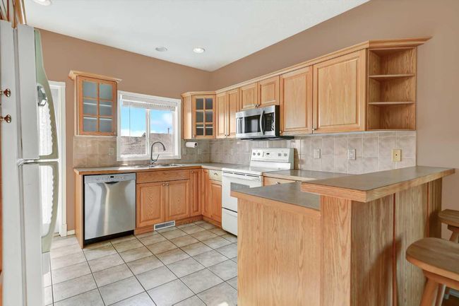 12301 Crystal Lake Dr, House detached with 4 bedrooms, 3 bathrooms and 6 parking in Grande Prairie AB | Image 7