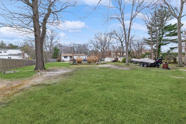 View of yard with fence | Image 31