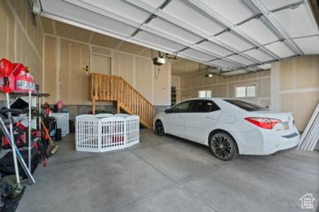 Garage featuring a garage door opener | Image 44