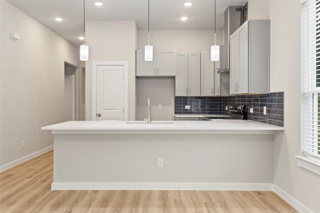 A beautifully designed kitchen that blends modern elegance with cozy charm—perfect for creating unforgettable meals and memories! | Image 8