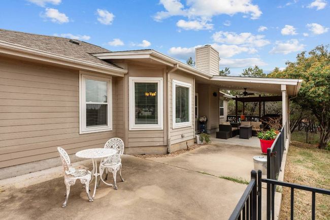 View of patio / terrace with outdoor lounge area and a ceiling fan | Image 10