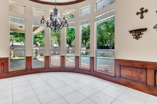 Is there a better and more serene spot to start your day than this breakfast nook? Enjoy pool views while you sip coffee or tea and plan your day. | Image 15