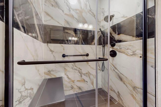 Interior details with a marble finish shower | Image 31