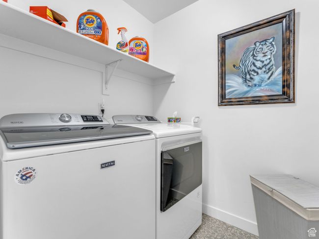 Laundry room with washer and dryer | Image 25