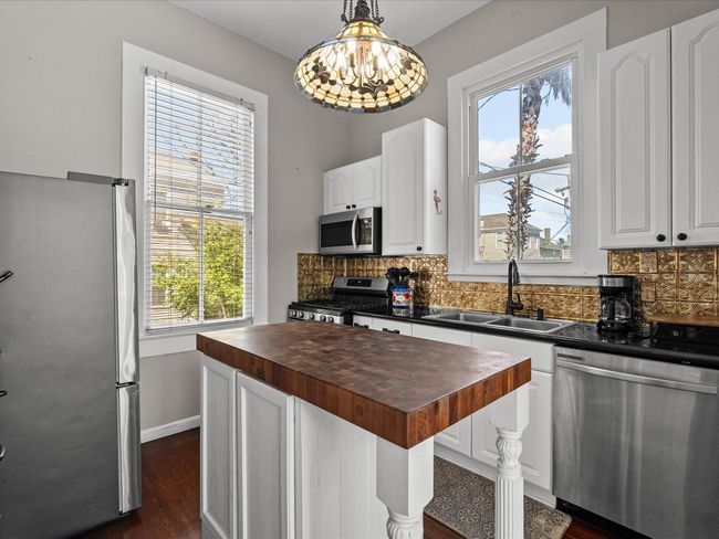 Kitchen with custom butcher block island | Image 32