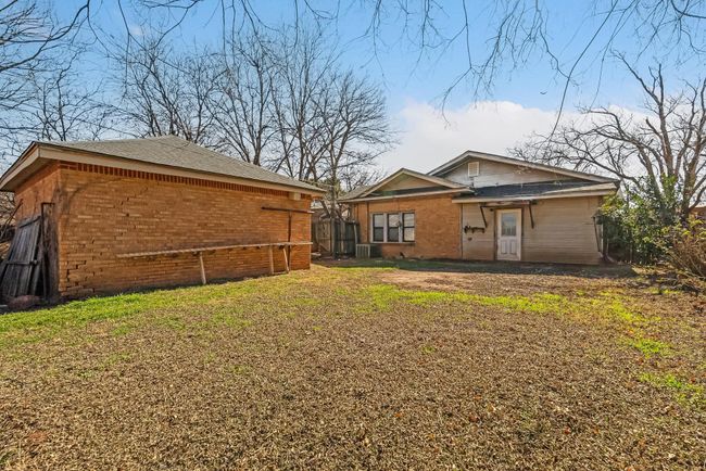 Rear view of house featuring a yard | Image 35