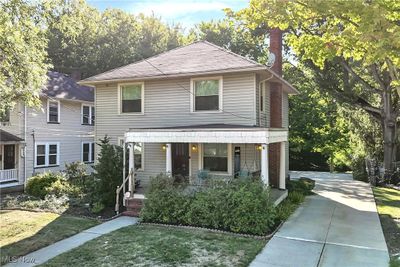 View of front of house with a front yard and a porch | Image 1