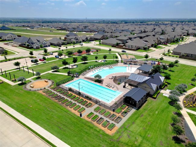 Aerial view of residential area featuring a pool area | Image 26