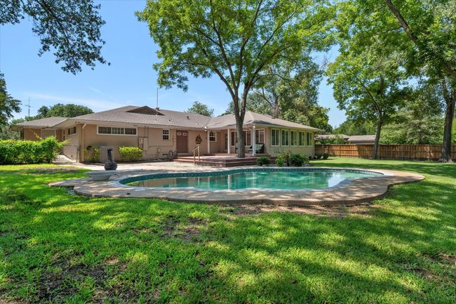 Beautiful shaded lot with pool | Image 33