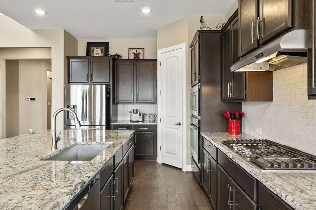 Plenty of storage above and below as well as gas 5 burner cooktop | Image 18
