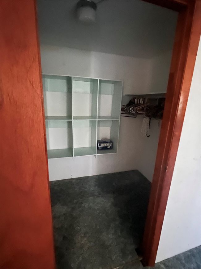 Large walk in closet for main bedroom. | Image 7