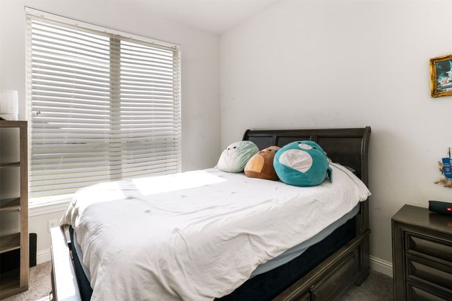 Bedroom featuring baseboards and carpet flooring | Image 29