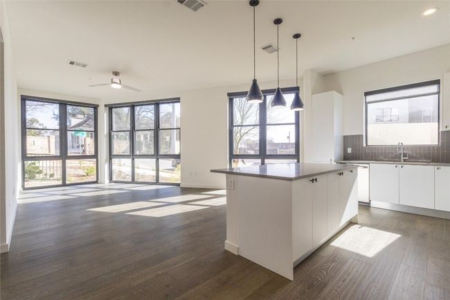 Open kitchen to living room - wonderful floor to ceiling windows | Image 8