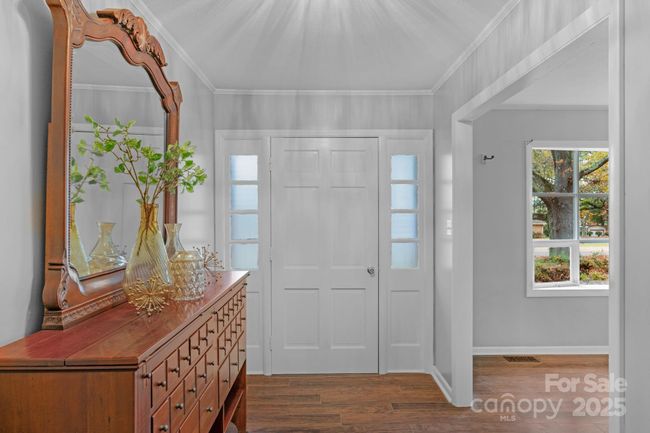 Light and bright foyer welcomes guests! | Image 35