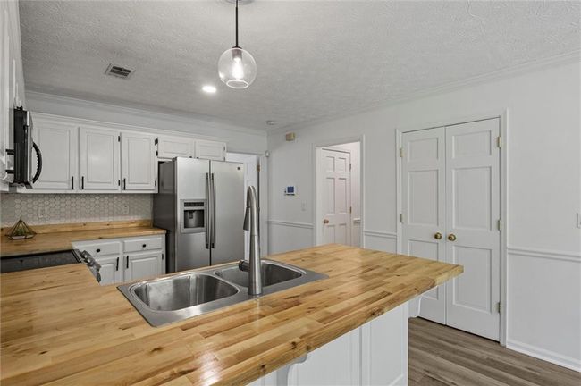 4220 Singing Post Ln Ne, House other with 5 bedrooms, 3 bathrooms and 2 parking in Roswell GA | Image 21