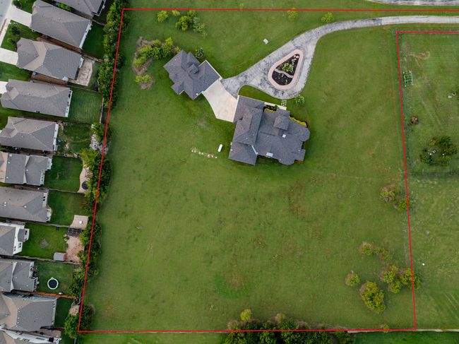 Aerial view of residential area featuring property parcel outlined | Image 35