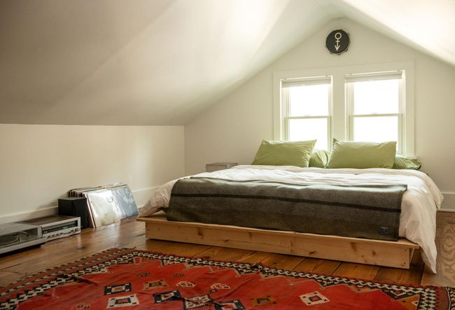 Bedroom featuring lofted ceiling and hardwood / wood-style floors | Image 18