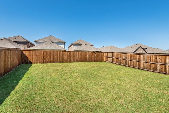 View of yard featuring a fenced backyard | Image 32