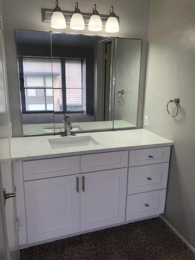 Bathroom with vanity and baseboards | Image 14