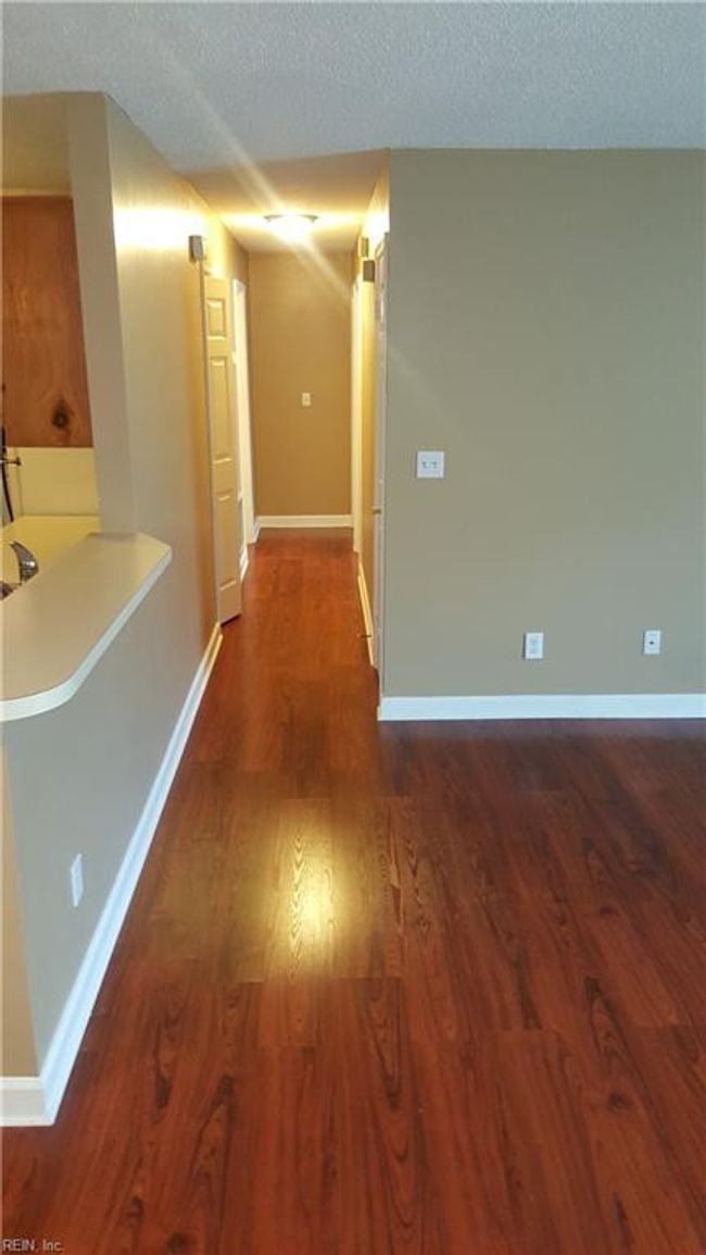 Long Hallway to Private Bedrooms | Image 6