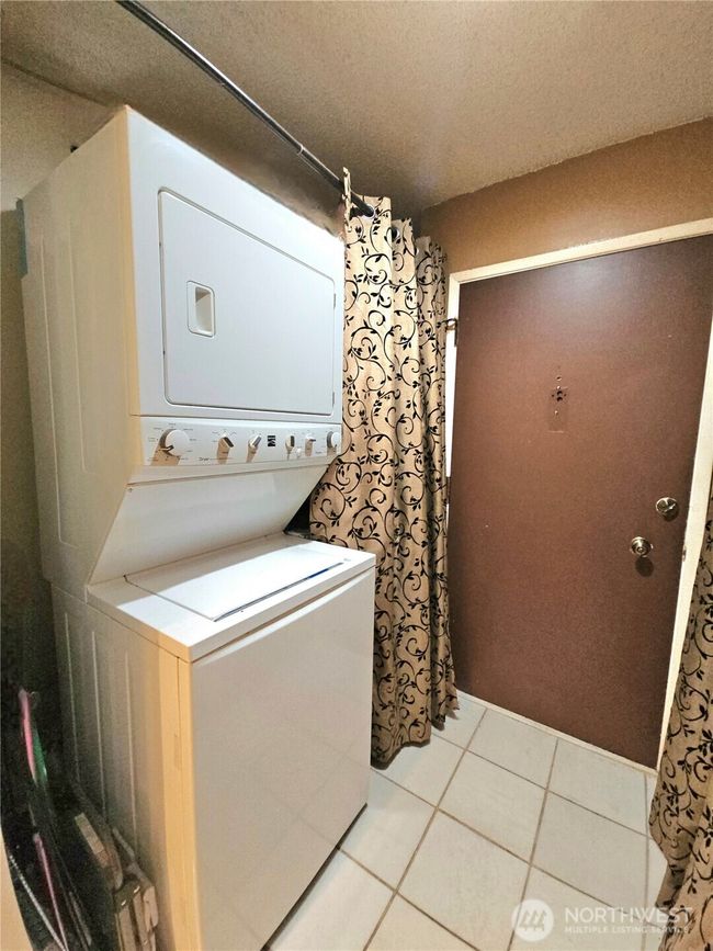 Stackable washer and dryer leave room for storage. | Image 4