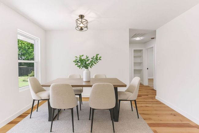 Dining area featuring light wood-type flooring | Image 13
