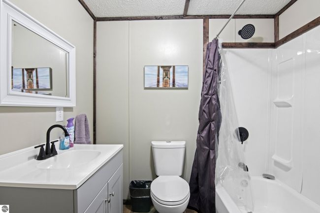 6015 Crystal Beach Rd Nw, House other with 4 bedrooms, 2 bathrooms and null parking in Rapid City MI | Image 26