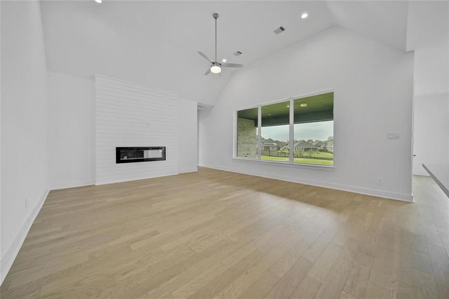 Cozy up by the gas fireplace with easy electric start | Image 23
