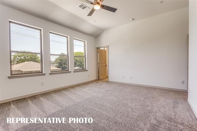 The light filled owner's suite in our Emily floor plan is a dream come true! REPRESENTATIVE PHOTO | Image 11