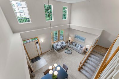 View of the soaring two story main level from the loft. | Image 3