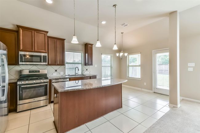 kitchen with stainless appliances | Image 21