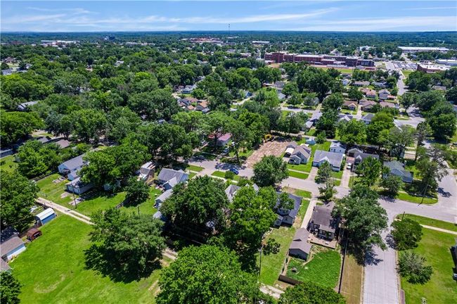 Aerial view of property's location with nearby suburban area | Image 54