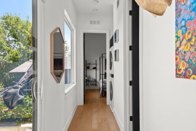 Corridor featuring light wood-type flooring and baseboards | Image 17