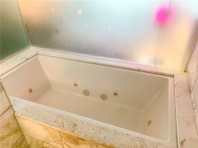 Full bathroom with a jetted tub | Image 8