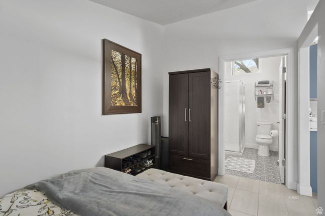 Bedroom with tile and ensuite bath | Image 9