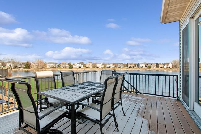 Maintenance Free deck overlooking backyard with pond views | Image 36