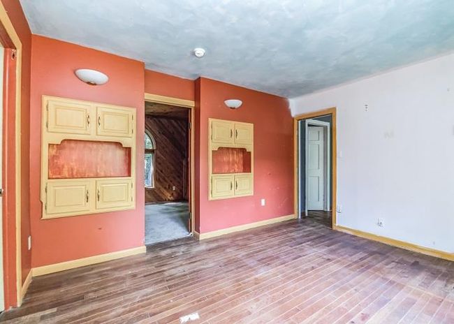 Spare room with hardwood / wood-style flooring | Image 7