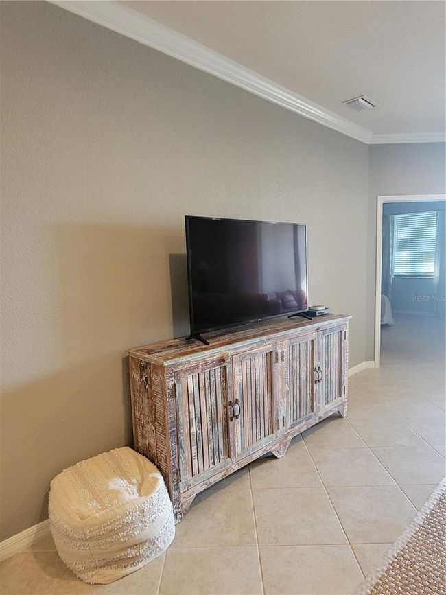TV and stand furnished | Image 16