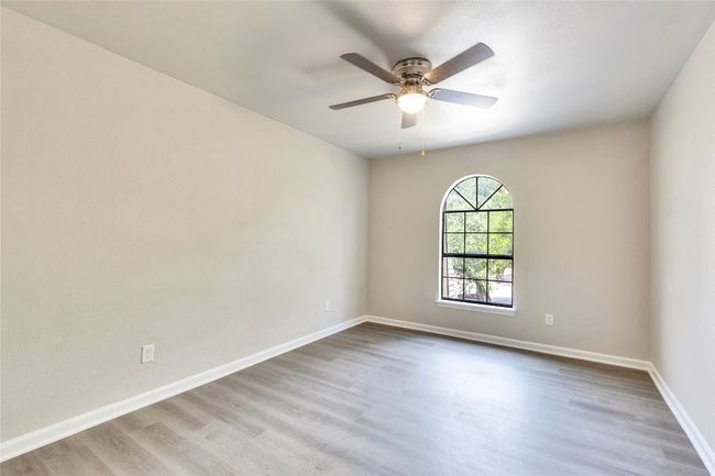 Third bedroom with walk-in closet and ceiling fan. | Image 29