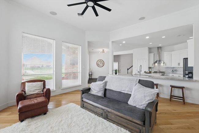 SPECTACULAR open concept living and dining areas. | Image 11