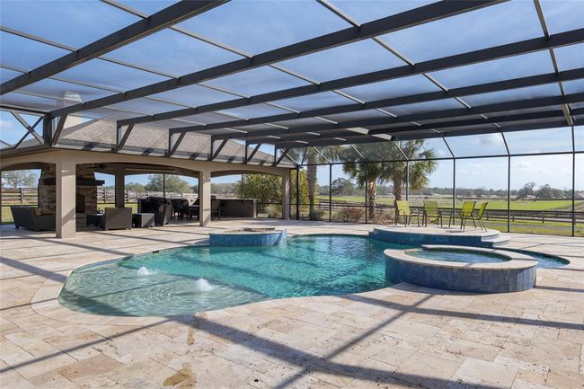 Pool with spa overlooking paddocks | Image 65