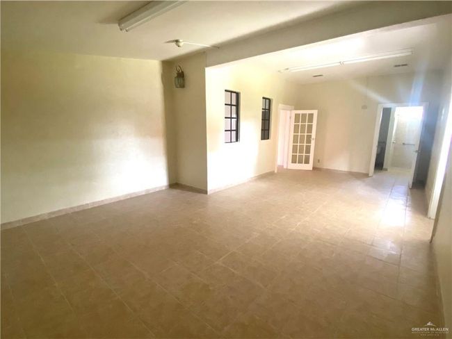 View of tiled empty room | Image 14