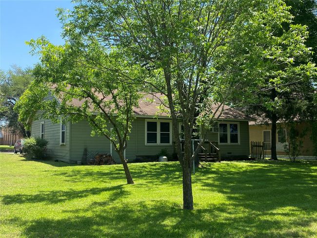 Rear view of property with a yard | Image 7