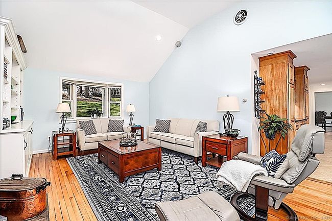 Living Room Flows Seamlessly into Kitchen | Image 12