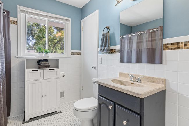 Main level full bathroom. | Image 13