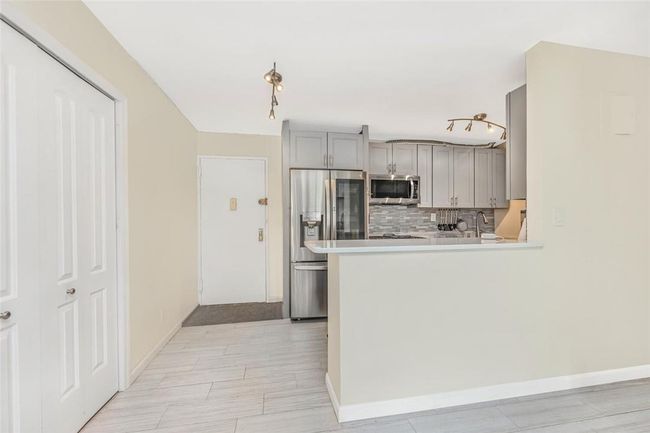 Kitchen/Foyer area | Image 8
