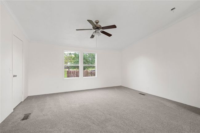 Carpeted spare room can be used as a 5th bedroom or office | Image 11