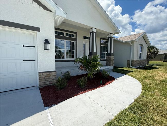 9469 Spring Cir, House other with 4 bedrooms, 2 bathrooms and null parking in Port Charlotte FL | Image 4